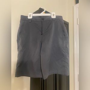 Boys Under Armour golf shirt.